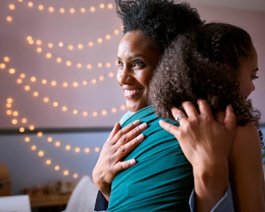 Mother Helping Teenage Daughter